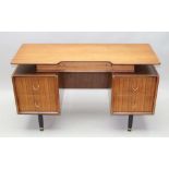 A G-PLAN MAHOGANY DRESSING TABLE, designed by E. Gomme in the 1960s, fitted drawers with brass