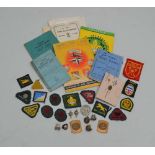 A SELECTION OF SCOUTING BADGES, to include pins and awards in cloth and metal, plus a selection of