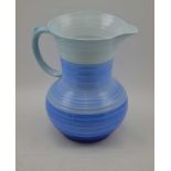 A SHELLEY COIL FORM WAISTED JUG, graduated blue glaze, 24cm high