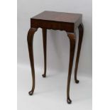 A 20TH CENTURY WALNUT VENEER LAMP TABLE, on cabriole supports, 35cm square