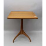 A BEECHWOOD MODERNIST OCCASIONAL TABLE, turned stem and tripod supports, the top 46cm x 46cm