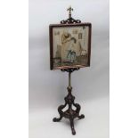 A 19TH CENTURY ROSEWOOD POLE SCREEN, decorative brass pole,with adjustable frame, containing a