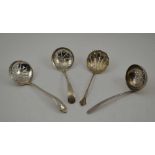 FOUR VARIOUS SILVER SIFTING LADLES, various designs and assay marks, to include the years; 1909,