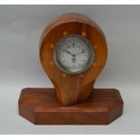 A FIRST WORLD WAR NOVELY MANTEL CLOCK, formed from the central section of a plane propeller,