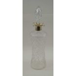 ELKINGTON & CO. A CUT GLASS DECANTER, with silver collar and four pouring lips, London 1906,