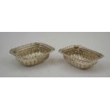 WILLIAM AITKEN A PAIR OF VICTORIAN SILVER SALTS, egg & dart pressed rims, fluted bodies, Chester