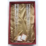 A PAIR OF ROYAL BRIERLEY CRYSTAL GLASS CHAMPAGNE FLUTES, limited edition for the millennium, No. 136