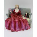A ROYAL DOULTON CERAMIC FIGURE, "Sweet and Twenty" HN 1298, depicted with a fan seated upon a