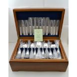 DAVENPORT & SULLIVAN A MAHOGANY CANTEEN OF SILVER-PLATED CUTLERY for twelve place settings,