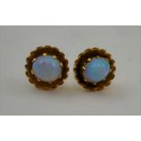 A PAIR OF 9CT GOLD OPAL SET EARRINGS, pierced fittings, gross weight; 2.6g