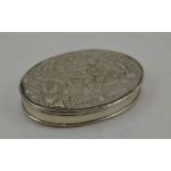 AN 18TH CENTURY OVAL SILVER SNUFF BOX, the repousse and engraved hinged cover with a scene of the