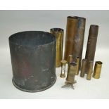 TWELVE BRASS SHELL CASES of various dimensions, one fashioned as trench art, with "Ypres" panel,
