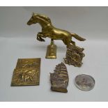A SELECTION OF BRASS WARES comprising; a jumping horse door stop, a "Tally Ho" "Bank" money box, a