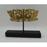 AN 18TH CENTURY REPOUSSE & PIERCED BRASS DECORATIVE HAIR ORNAMENT, considered to be Ottoman-Greek,