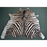 A LARGE ZEBRA SKIN, maker DC1894 en verso