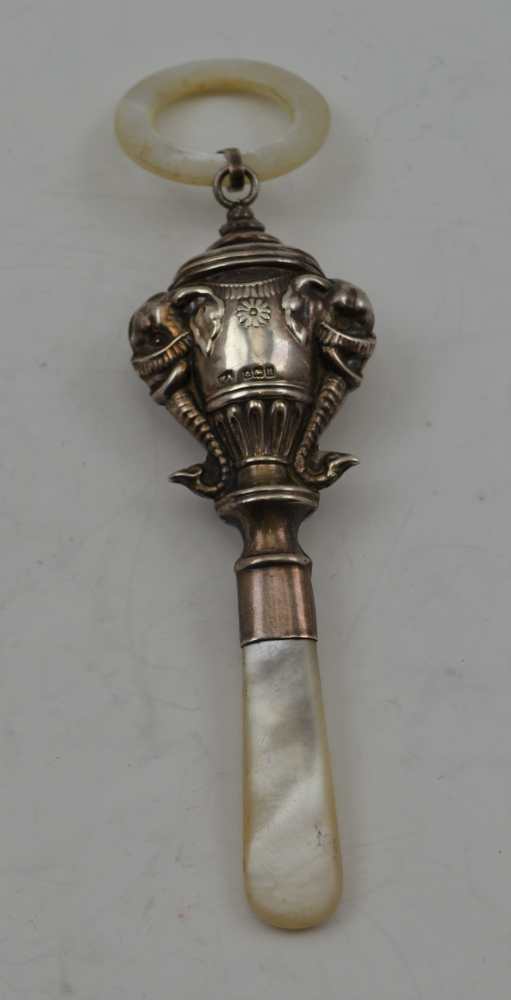 WILLIAM ADAMS LTD A SILVER CHILD'S RATTLE, having embossed elephant head decoration, with mother - Image 2 of 5