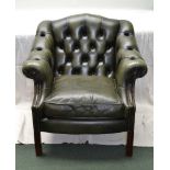 A VICTORIAN DESIGN LIBRARY LEATHER UPHOLSTERED EASY CHAIR, green button back with studded detail, on