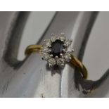 AN 18CT GOLD LADY'S SAPPHIRE & DIAMOND DRESS RING, ring size; "T"