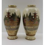 A PAIR OF JAPANESE MEIJI PERIOD SATSUMA CERAMIC VASES of baluster form, painted and gilded in
