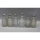 SIX VARIOUS SPIRIT DECANTERS with stoppers