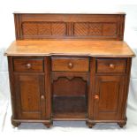 A LATE 19TH CENTURY AESTHETIC PERIOD PITCH PINE CUPBOARD, the upstand panel with stylised floral