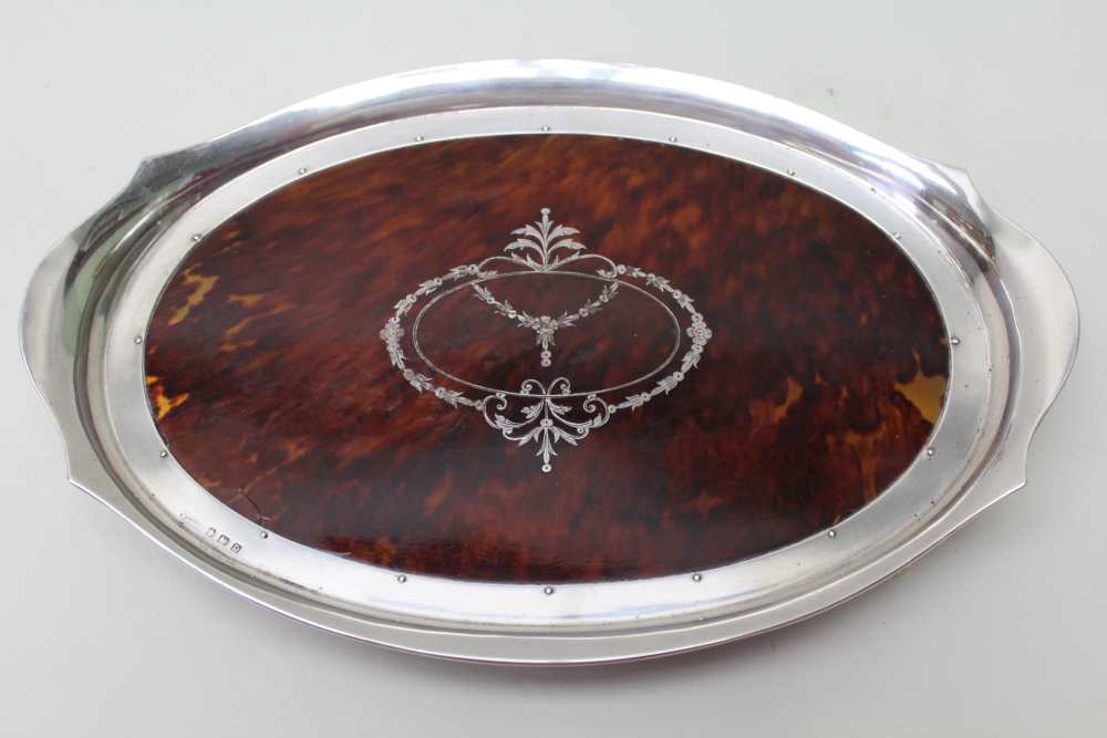 A SILVER & TORTOISESHELL DRESSING TABLE TRAY, Birmingham 1928, with inlaid decoration, 31cm x 21cm