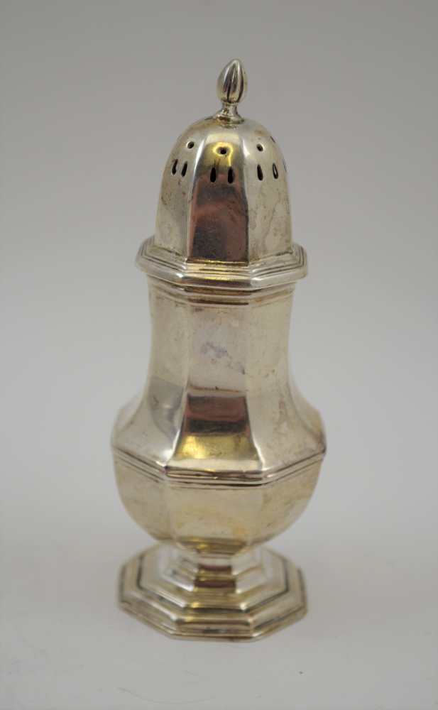 CHARLES WESTWOOD & SONS A GEORGIAN DESIGN SILVER CASTER, of octagonal baluster form, 11cm high,