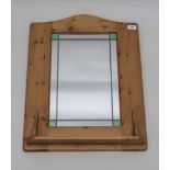 A PINE FRAMED WALL MIRROR, leaded mirror plate, with shelf to the base, overall size; 64cm x 49cm