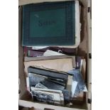 A BOX CONTAINING A SELECTION OF EPHEMERA to include vintage photographs, old scrap album, &