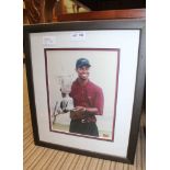 A SIGNED PHOTOGRAPH OF TIGER WOODS