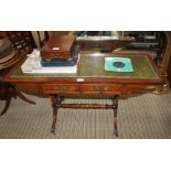 A REPRODUCTION MAHOGANY FINISHED RECTANGULAR TOPPED COFFEE TABLE with tooled skiver top, having