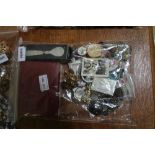 A SEALED BAG OF COSTUME JEWELLERY & associated items