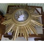 A SMITHS ELECTRONIC GOLDEN SUNBURST WALLCLOCK