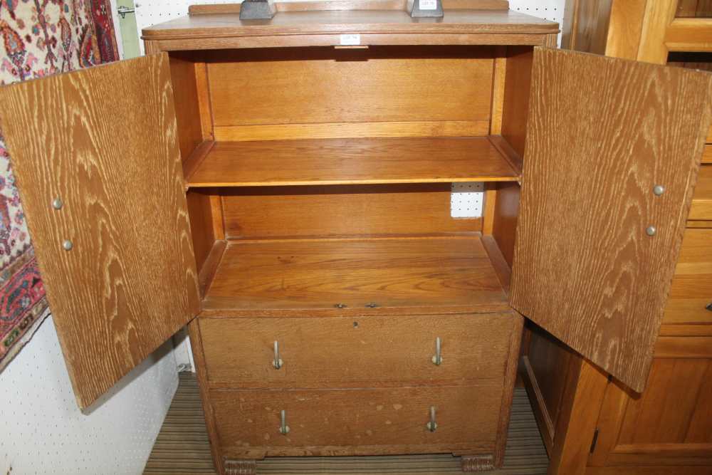 A SCRUBBED OAK TALLBOY STYLE UNIT with two cupboard doors over two full width drawers - Image 3 of 3