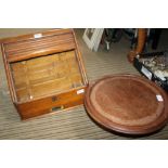 A WOODEN LAZY SUSAN together with a late 19th century tambour fronted stationery tidy