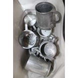 A BAG OF PEWTER TANKARDS