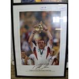 A LIMITED EDITION SIGNED MARTIN JOHNSON RUGBY WORLD CUP PHOTOGRAPH