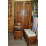 A LIGHT OAK FINISHED BEDROOM SUITE comprising two door fitted wardrobe, single bedside pot