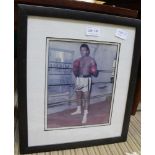 A SIGNED PHOTOGRAPH OF MOHAMMED ALI