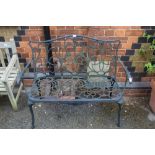 A CAST METAL TWO PERSON GARDEN BENCH