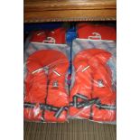 AN O'BRIEN 'LE TUBE' together with four orange lifejackets
