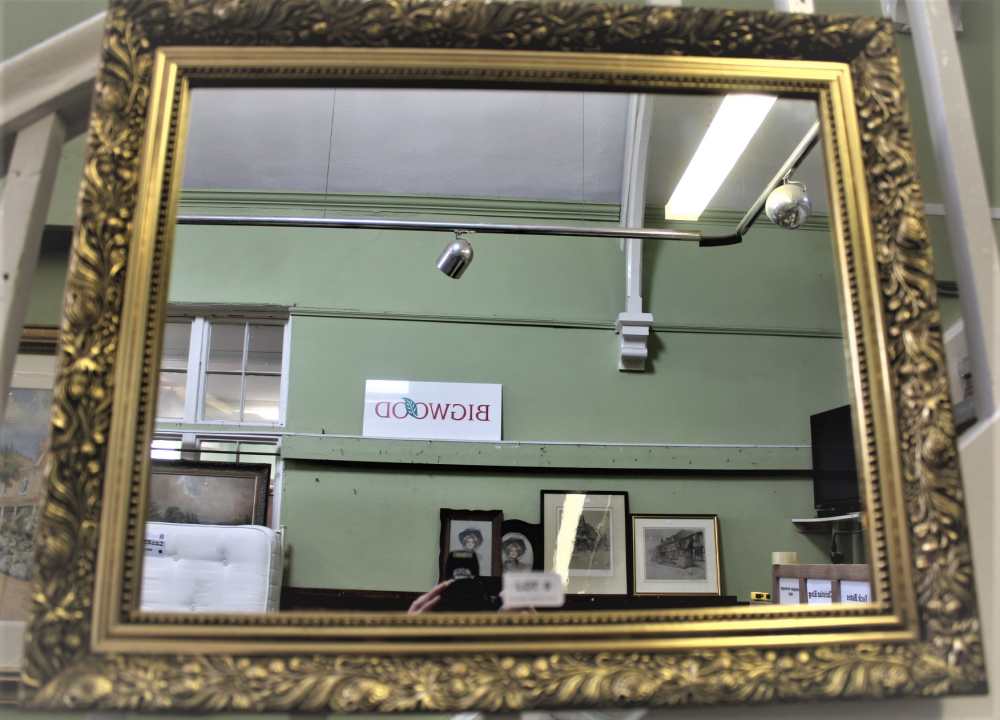 A SMALL RECTANGULAR PLAIN PLATE WALL MIRROR with fancy moulded gilt frame