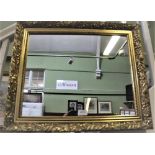 A SMALL RECTANGULAR PLAIN PLATE WALL MIRROR with fancy moulded gilt frame