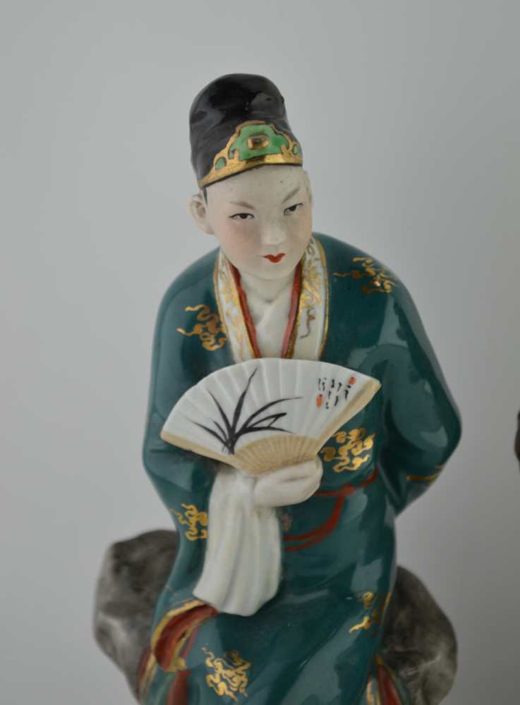 TWO ORIENTAL CERAMIC FIGURES, polychrome decorated, one a seated figure with a fan, the other seated - Image 2 of 5