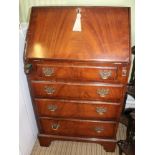 A SLENDER MAHOGANY BUREAU of typical form & construction, having well fitted interior