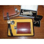 A BAG CONTAINING THREE MODERN HIP FLASKS together with a selection of costume jewellery & a