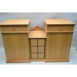 SEAN FEENEY A BESPOKE MADE OAK AUDIO CABINET, having twin towers, with single drawer top over double