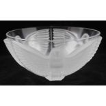 A CRYSTAL GLASS BOWL, moulded and etched with three birds, having outstretched wings, in the