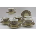 A SET OF SIX ROYAL WORCESTER PORCELAIN COFFEE CUPS & SAUCERS, "Lady Evelyn" pattern, enamelled