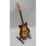 A 1960s TEISCO DEL RAY ELECTRIC SEMI-ACCOUSTIC GUITAR, finished in sunburst pattern, model EP-8T,